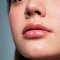 Flower Knows Shell's Jewel Lip Glaze 3-in-1 graphic highlights treatment, oil, and gloss benefits.