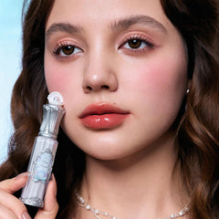 Flower Knows Lip Glaze featuring meadowfoam seed oil for softness