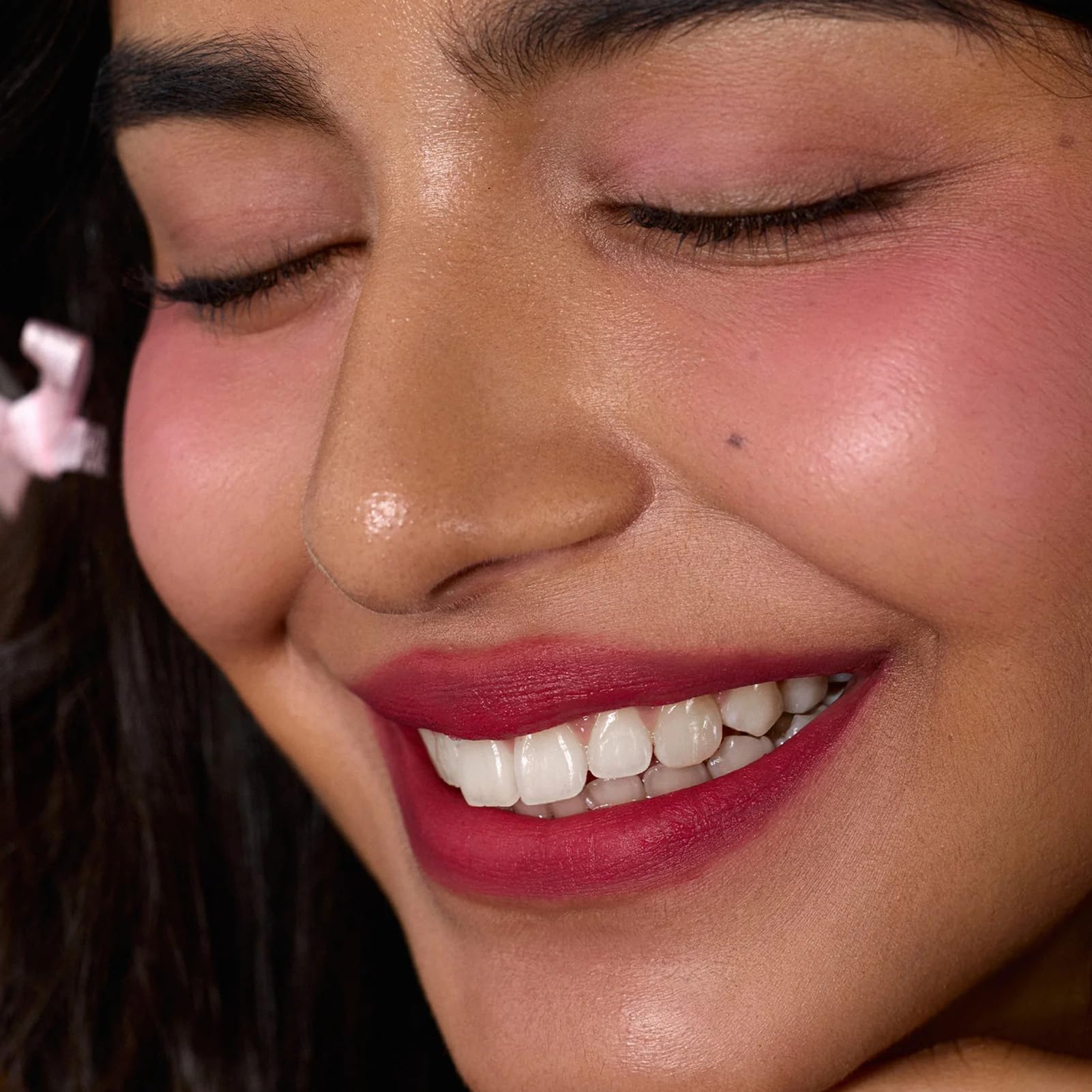 Flower Knows lip cream on lips shows bright Tulip shade