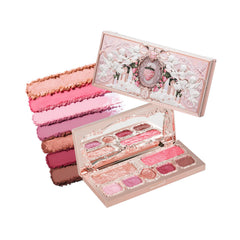 Flower Knows Strawberry Cupid Palette open compact with five matte and two shimmer shades for versatile day-to-night looks.