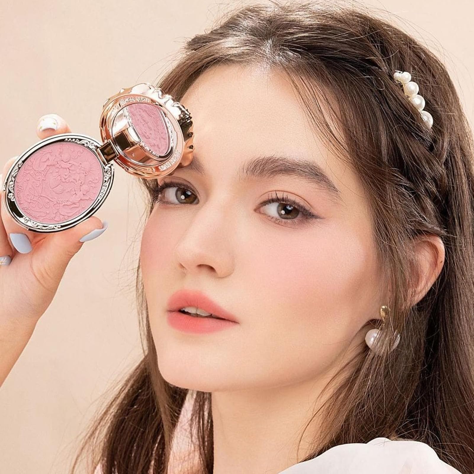 Fine powder texture enables smooth, buildable color with Flower Knows blush.