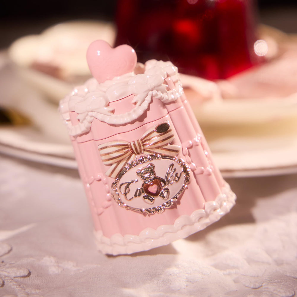 Flower Knows Ribbon Pink shade on lips delivering sheer, sparkling glow