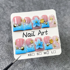 Flower Press on Nails showcasing a 3D golden flower detail for an elegant accent