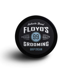 Floyd's 99 Grooming Grip Cream packaging close-up, travel-friendly design.