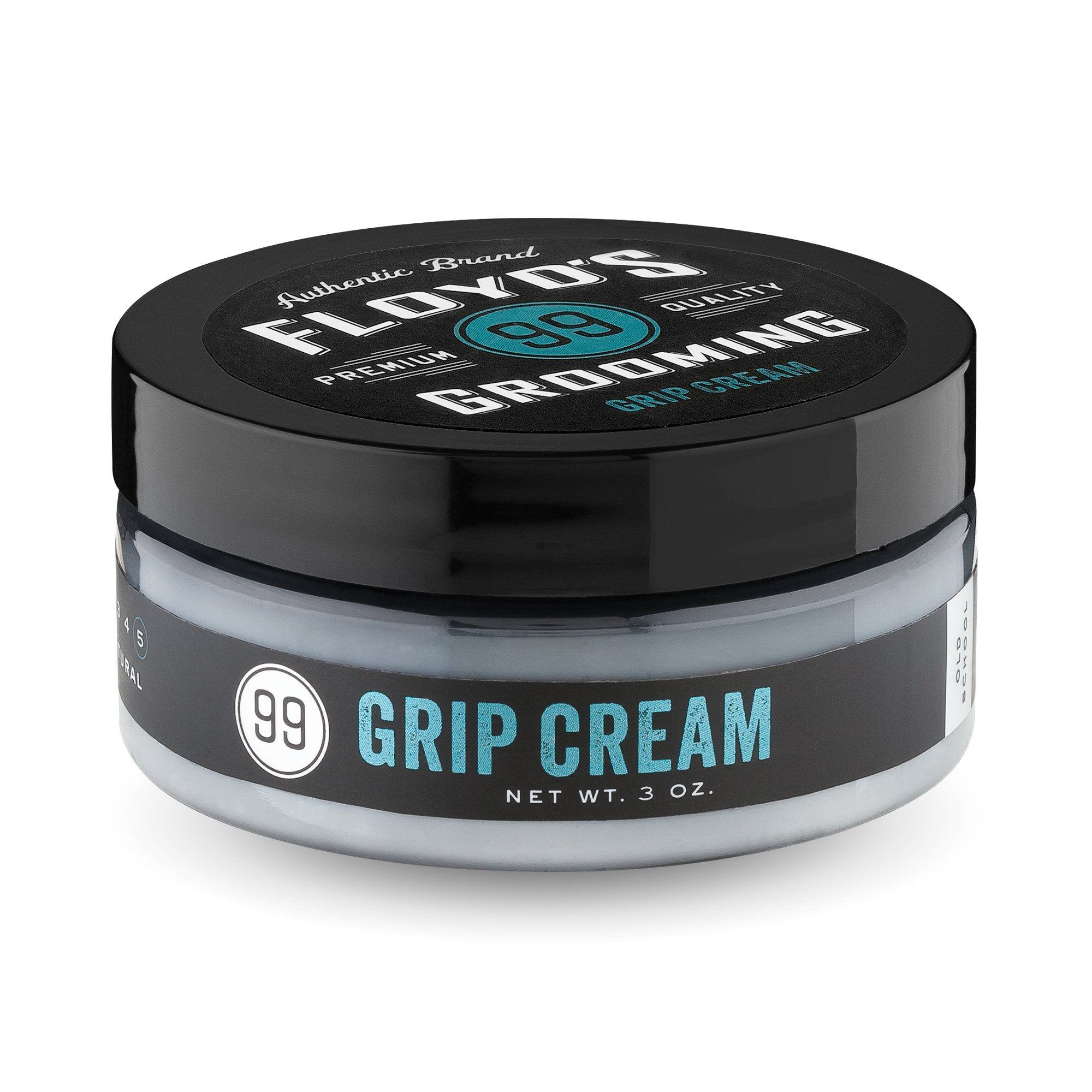 Floyd's 99 Grooming Grip Cream texture in hand shows lightweight, pliable formula.