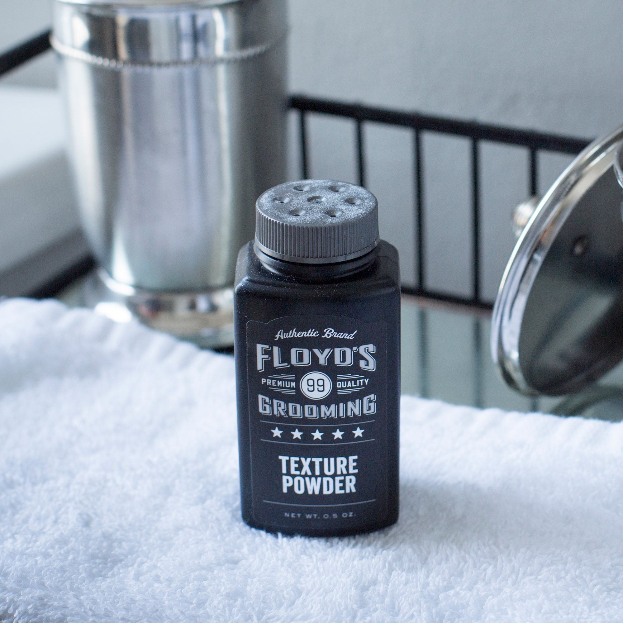 Floyd's 99 Hair Styling Powder absorbing oil for a refreshed appearance