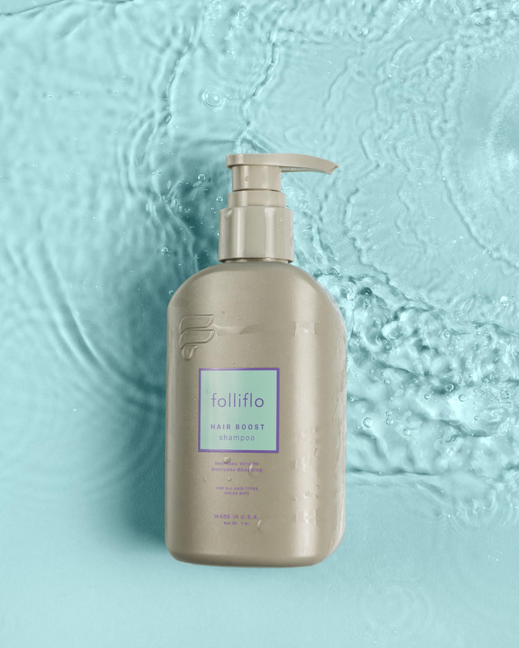 Close-up on hair strands with Folliflo showing thicker-looking appearance.