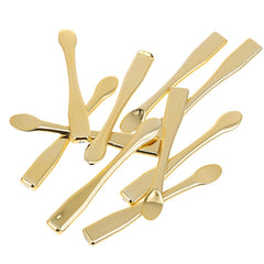 FOMIYES eye cream spatula in gold packaging for precise, mess-free application.