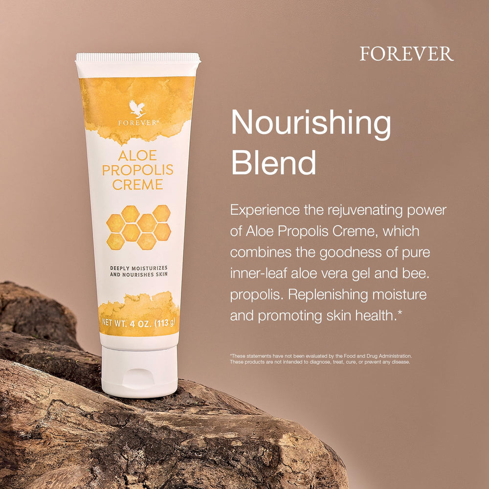 Forever Living Aloe Propolis Creme texture close-up shows creamy moisture.