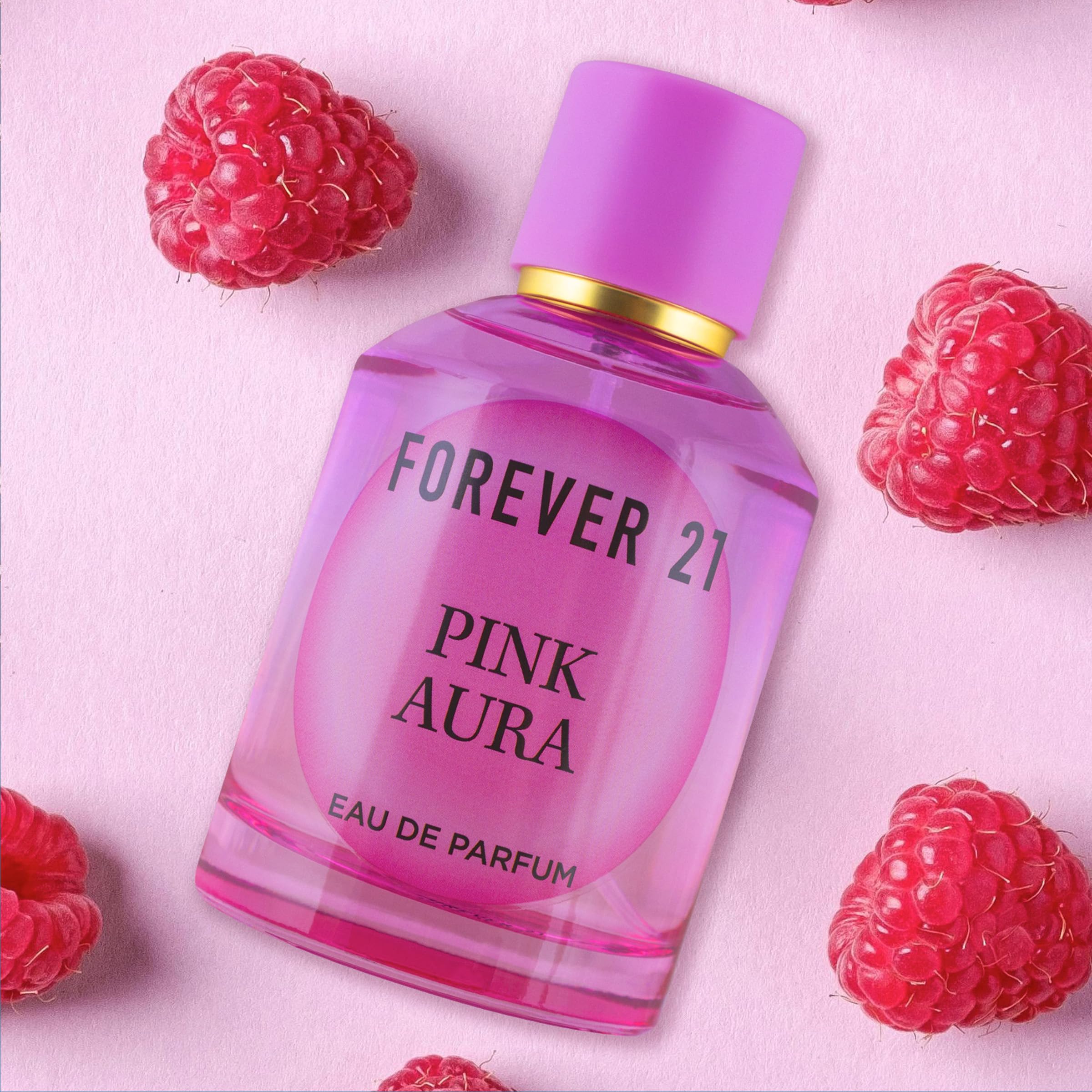 Forever 21 Pink Aura spritz application shows quick fragrance release.