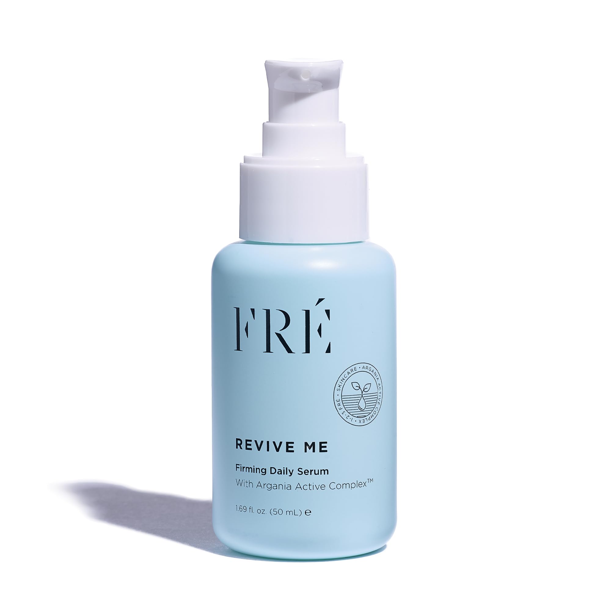 FRÉ Revive Me serum bottle close-up, showcasing a silky, lightweight texture.