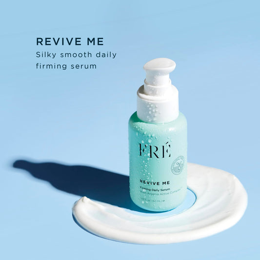 FRÉ Revive Me serum on hand, ready for easy daily application.