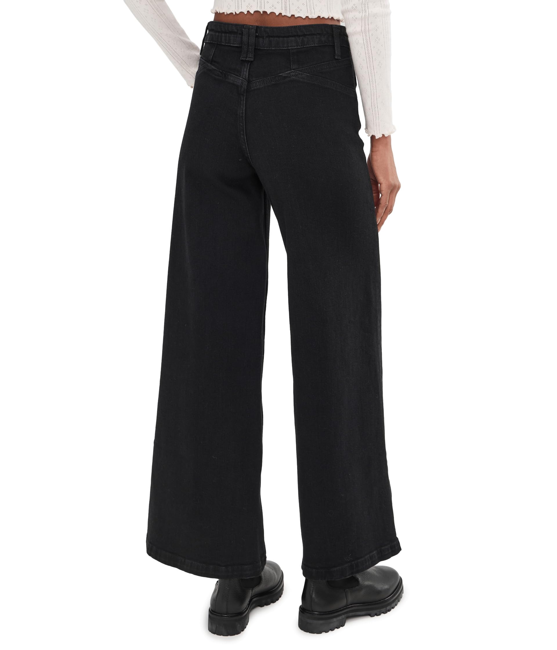 Free People Kellee high-rise palazzo pants, pleats visible, adds movement and drape.