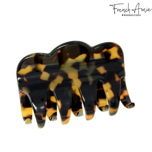 French Amie Crown Wave Yellow Tokyo small clip close-up showing interlocking teeth for grip.
