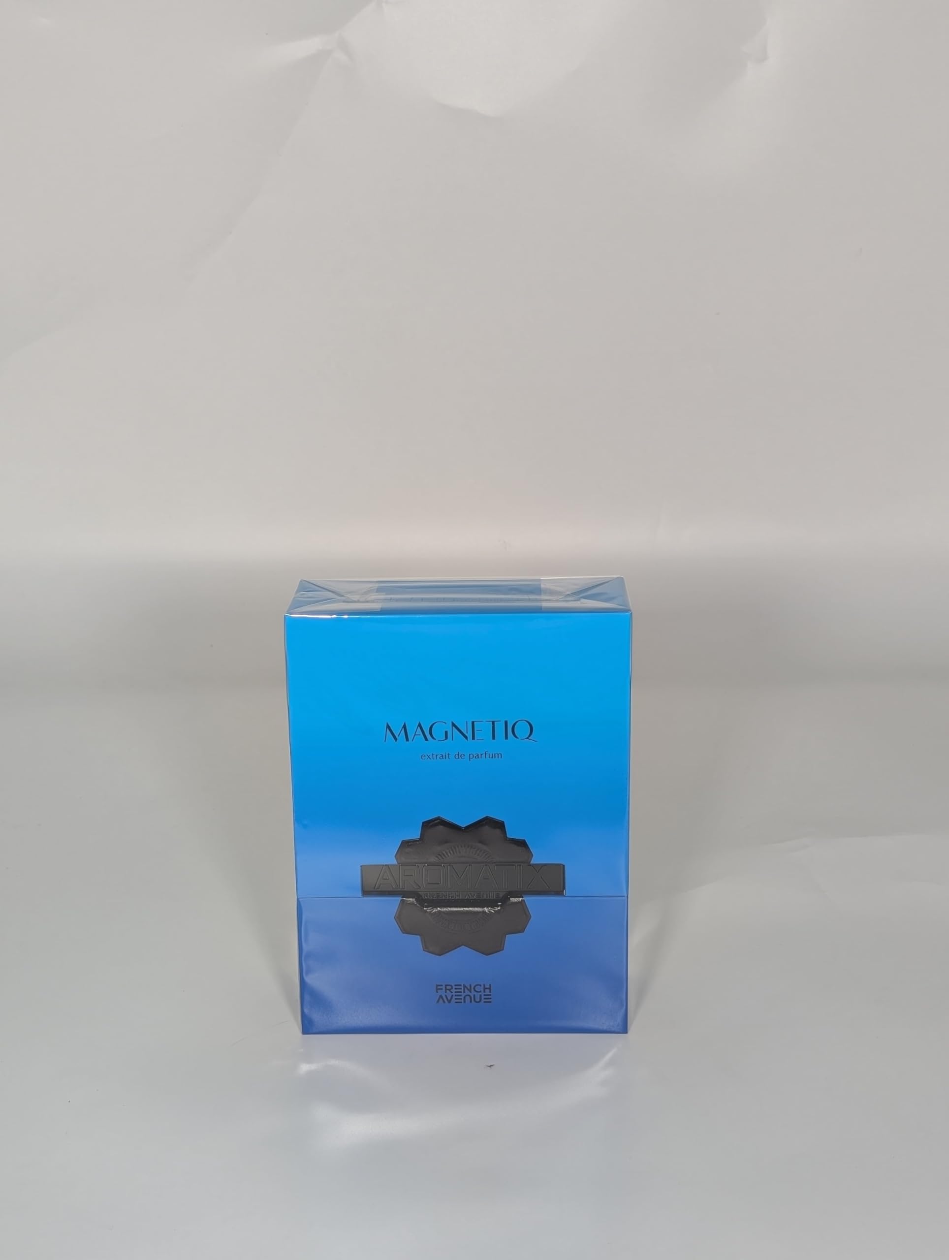 French Avenue Magnetiq blue bottle with black accents adds premium flair to your vanity.