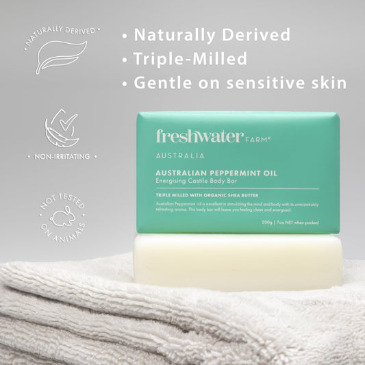 Freshwater Farm Australia energizing castile soap closeup bar shows creamy lather for dry skin.