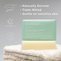 Close-up of creamy lather from Freshwater Farm Australia tea tree eucalyptus soap bar.