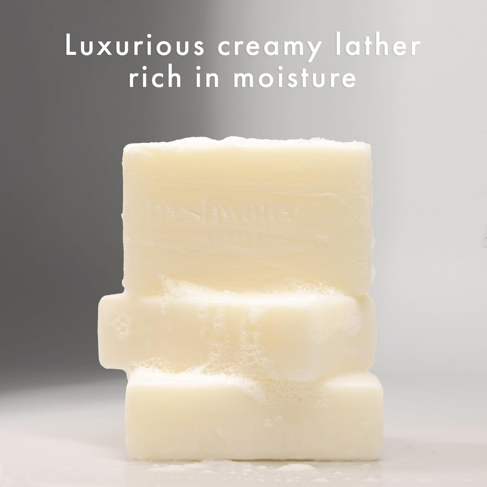 Natural ingredients panel highlights olive oil and shea butter for nourished skin.