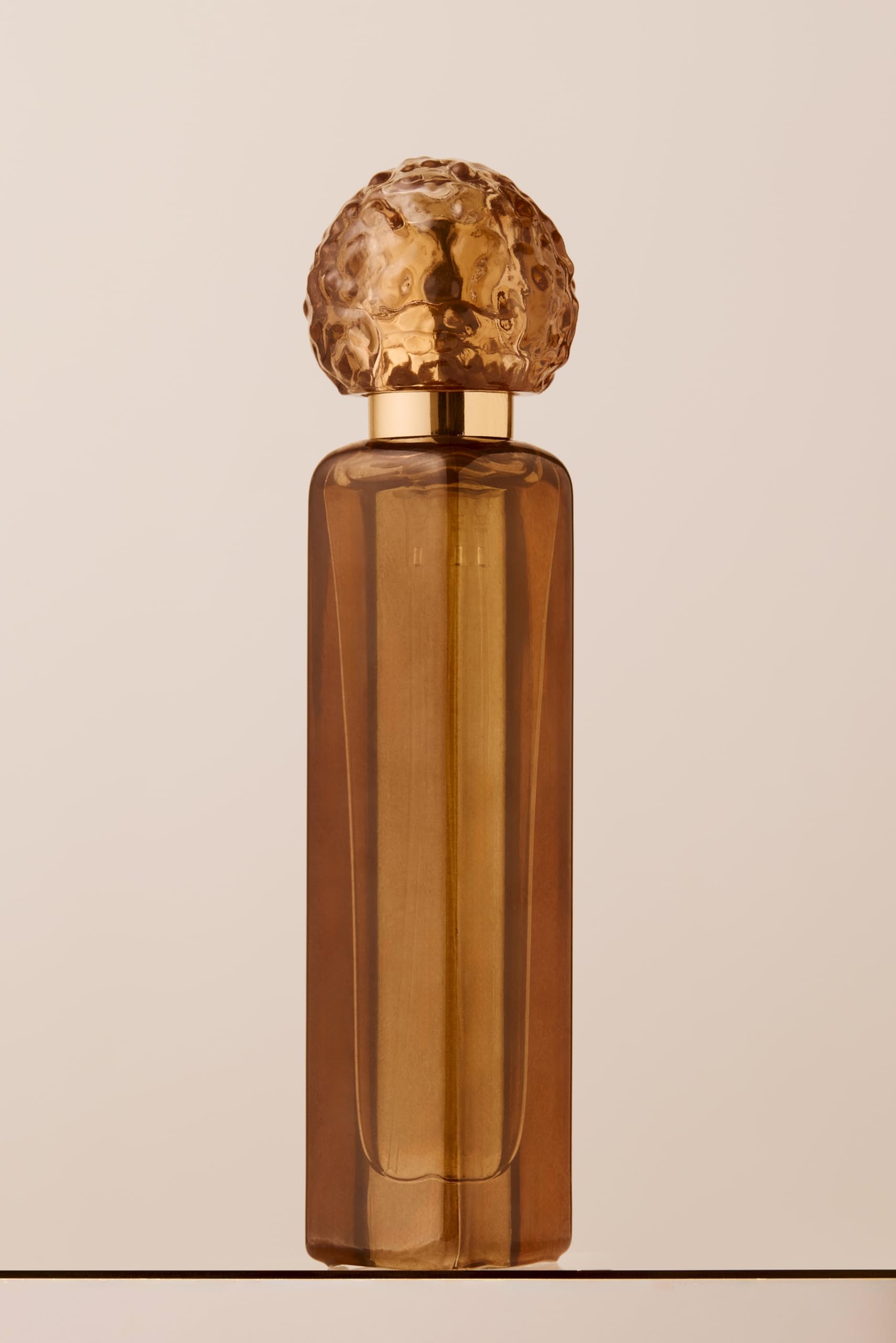 Fridays with Tab and Chance Traveler Her Business EDP bottle with long-lasting gourmand aroma for evenings.