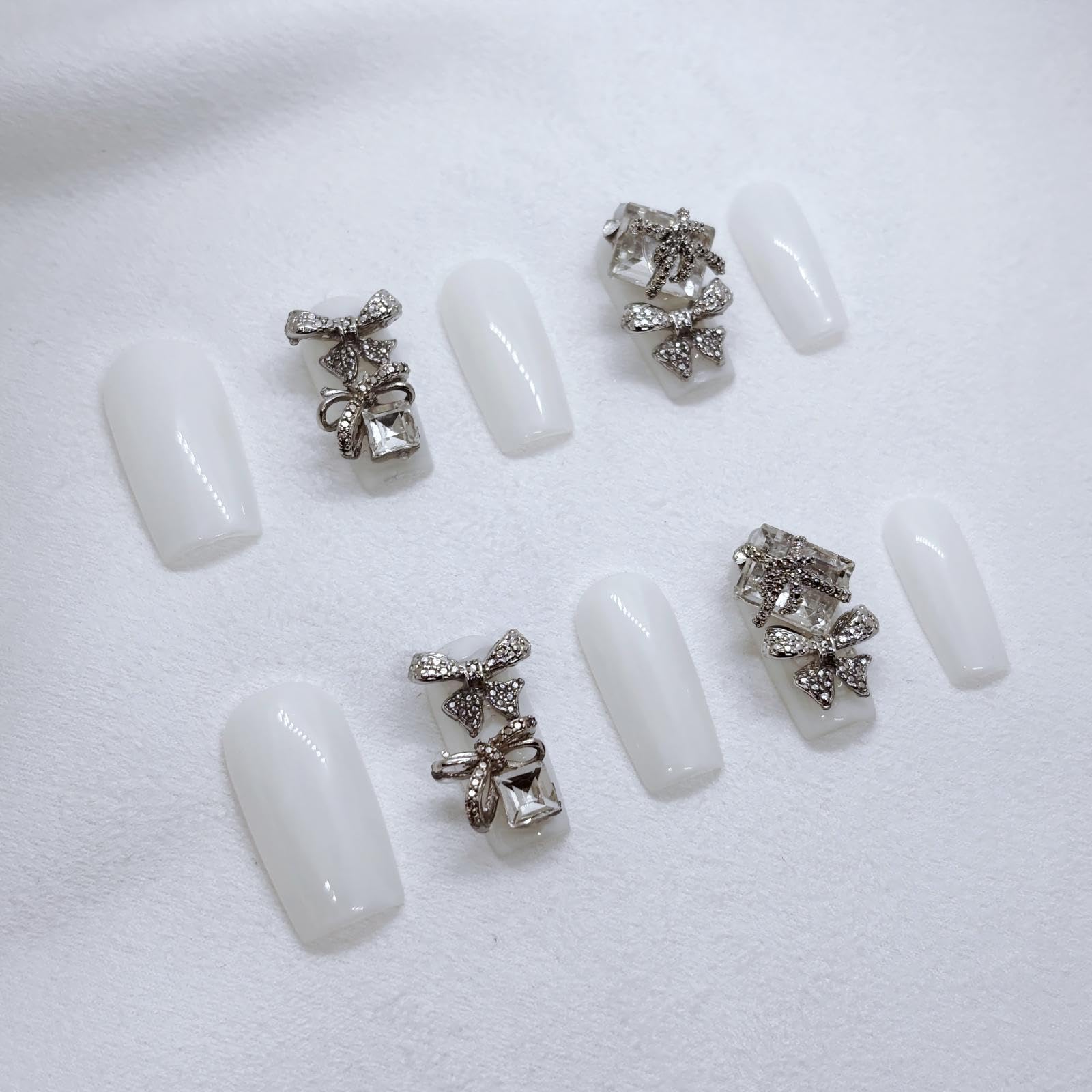 FURNUNUBI 3D jeweled nails design featuring sparkling detailing for party-ready hands