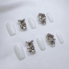 FURNUNUBI 3D jeweled nails design featuring sparkling detailing for party-ready hands