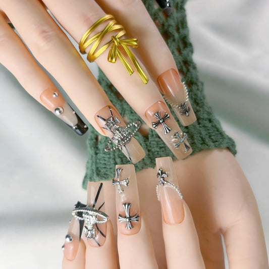 FURNUNUBI nails featuring 3D Saturn charms for celestial style and trendy flair.
