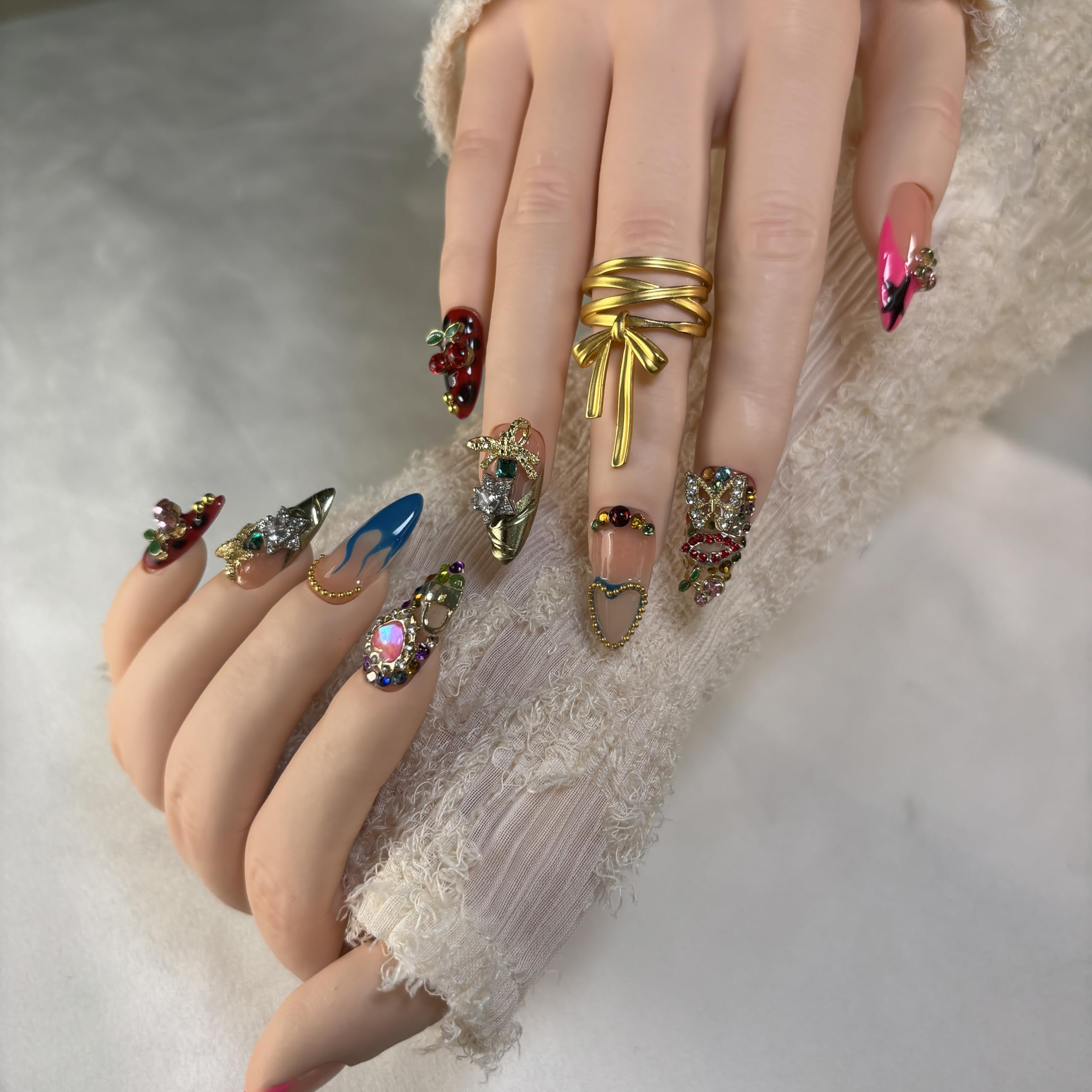 FURNUNUBI nails show 3D flowers and crystal hearts for luxe, tactile decoration.