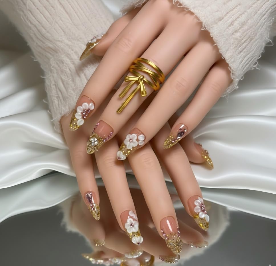 FURNUNUBI almond press-on nails with 3D flowers for a romantic focal point.