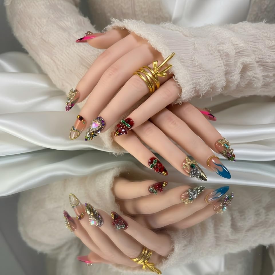 Furnunubi almond press-on nails with flames and cherry motifs for bold, eye-catching looks.