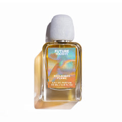 Elegant glass bottle catches light, signaling premium craftsmanship and fragrance clarity.