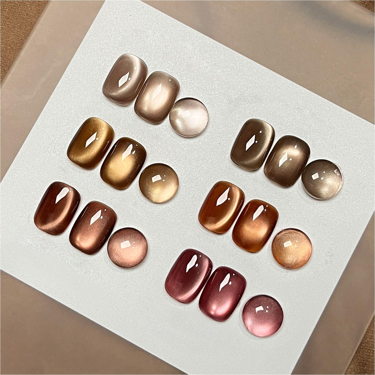 GAOY Jelly Brown Cat Eye gel polish set with magnet shows shimmering cat-eye effect.