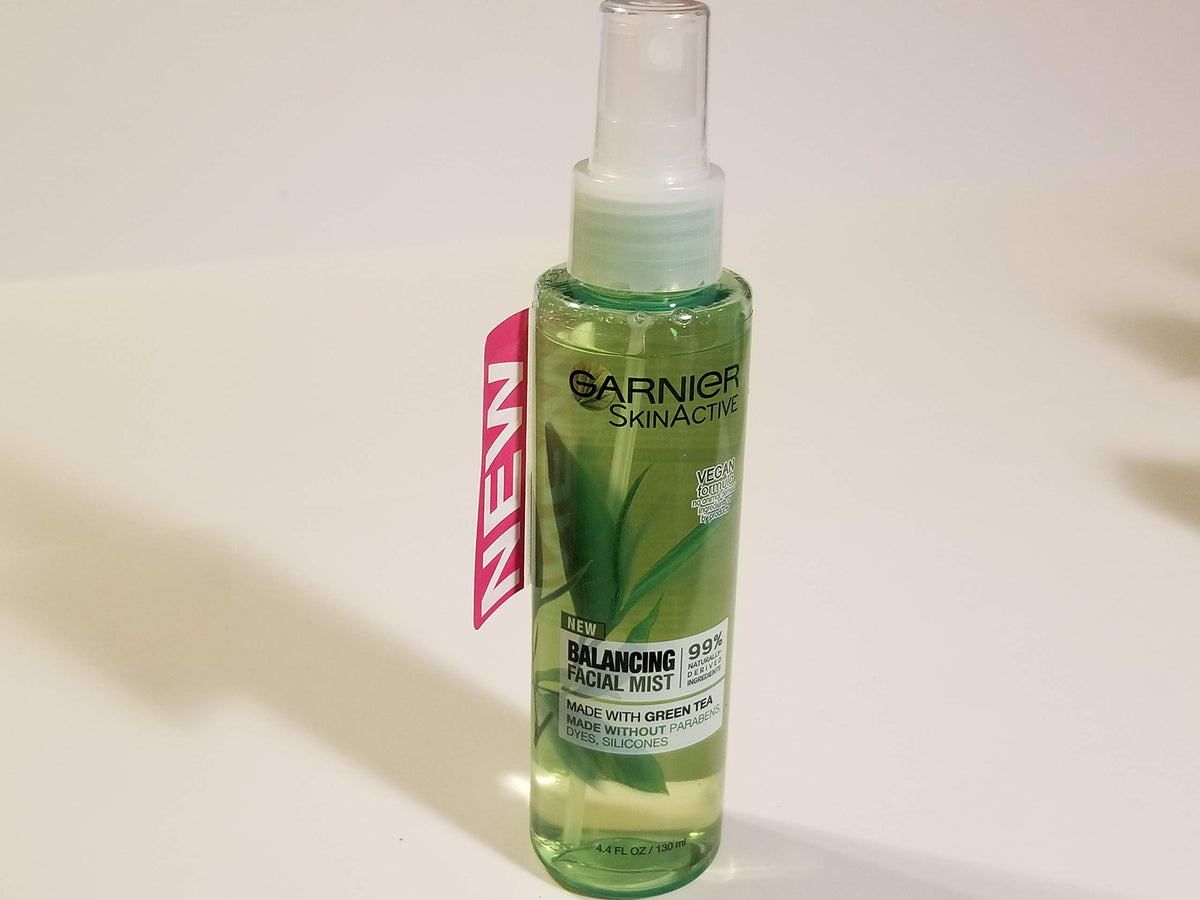 Garnier SkinActive Green Tea facial mist bottle pour delivers refreshing hydration.