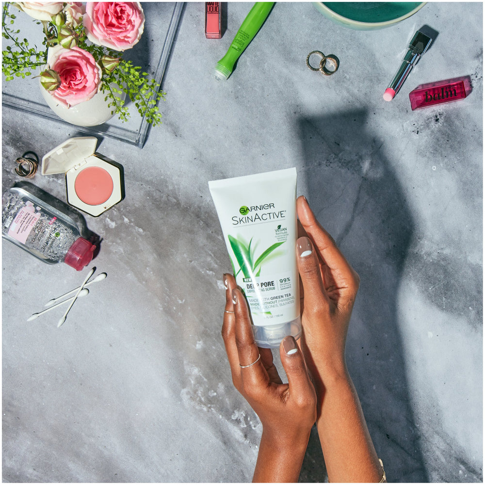 Paraben-free and sulfate-free icons on Garnier scrub packaging.