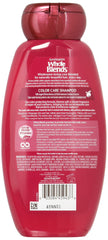 Garnier Whole Blends Color Care Shampoo label shows cranberry extracts for vibrant color.
