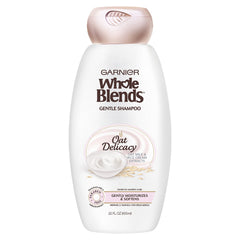 Garnier Whole Blends Gentle Shampoo Oat Delicacy bottle for gentle hydration on sensitive scalps.
