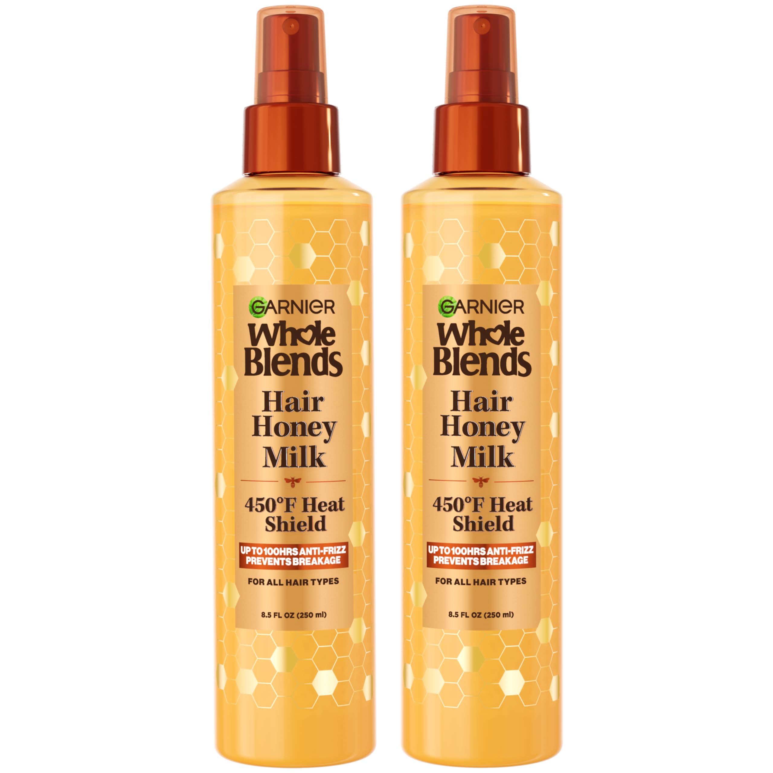 Garnier Whole Blends Honey Milk bottle with 450F heat protection for all hair types.