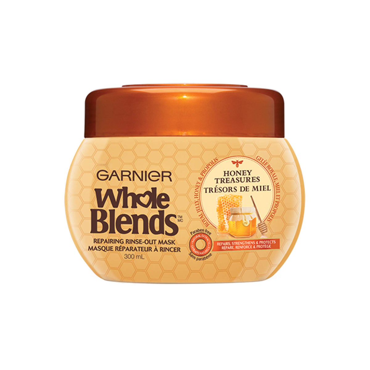 Garnier Whole Blends Honey Treasures mask bottle ready to nourish dry hair.