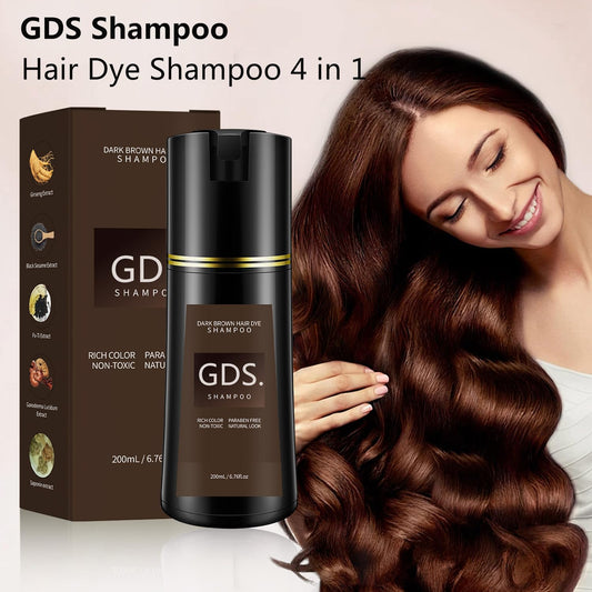 Hands applying GDS Shampoo color to hair during application