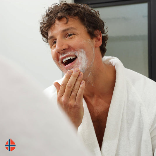 Geir Ness Face Scrub with ivory palm seeds demonstrates exfoliation and natural nourishment
