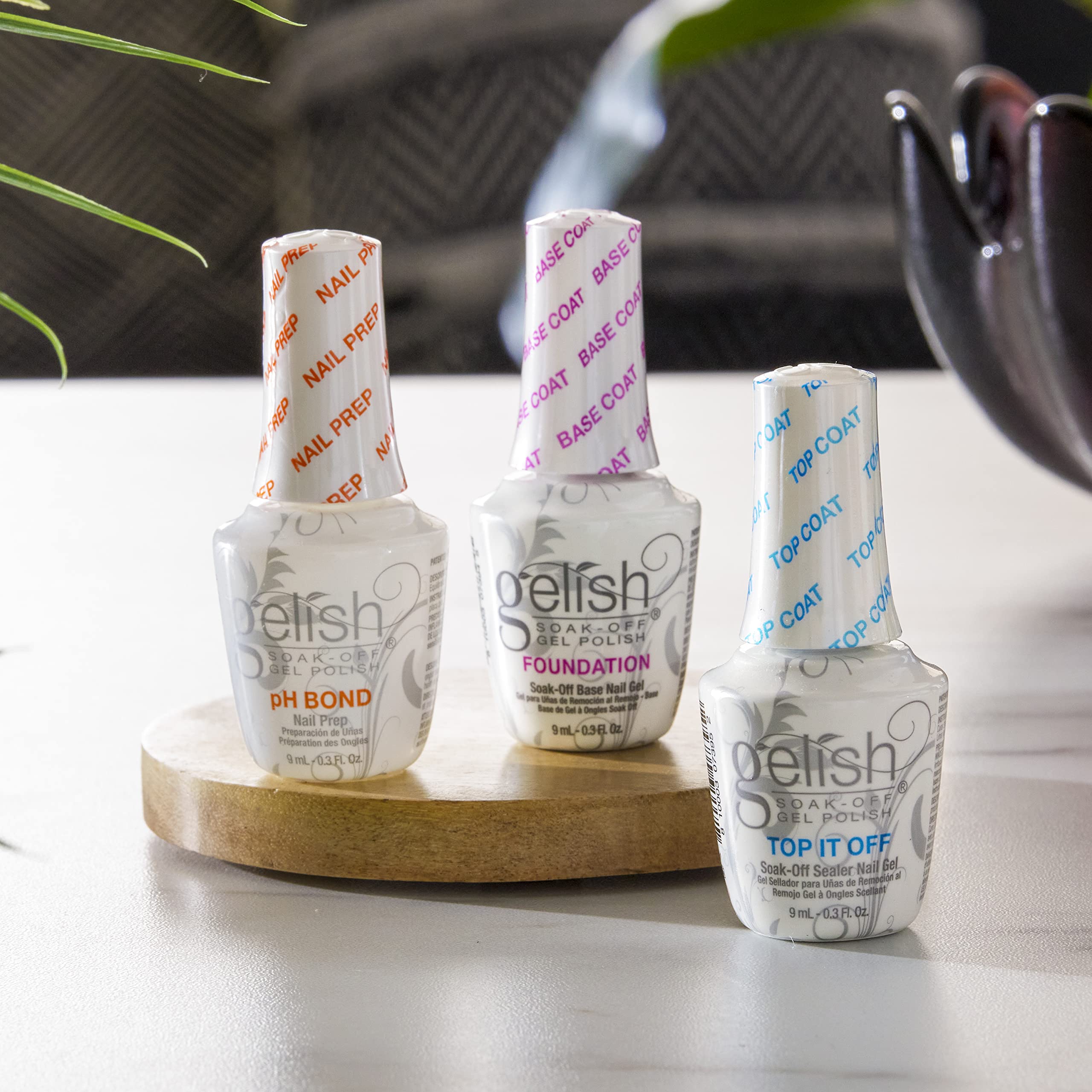 Gelish Mini Terrific Trio top-it-off bottle closeup with glossy top coat finish.