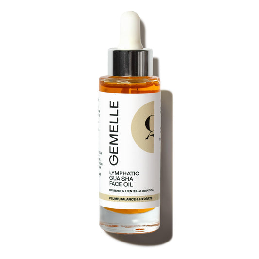 GEMELLE Lymphatic Gua Sha Face Oil bottle ready for easy glide during ritual use