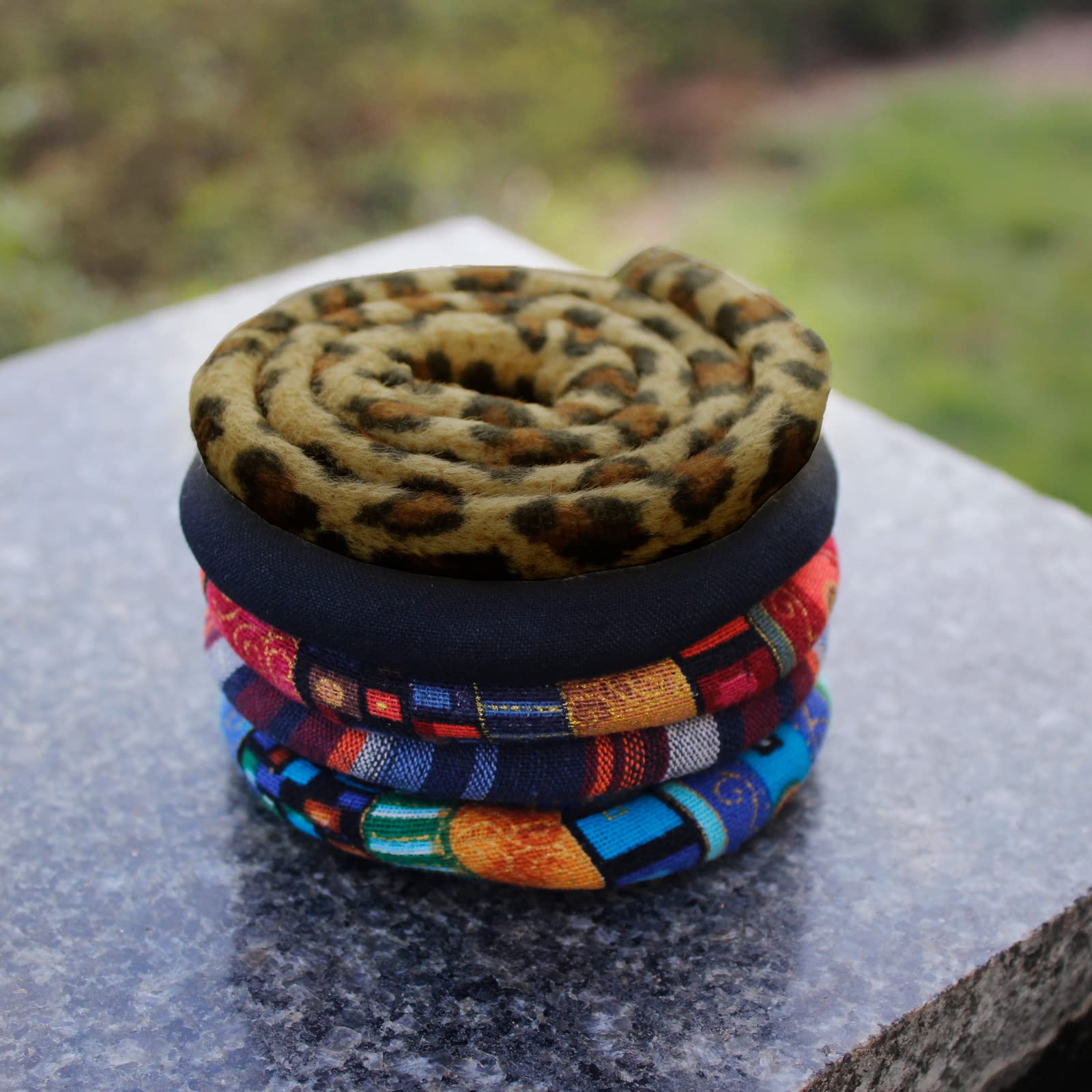 General 25-inch length wraps medium-thick dreads securely.