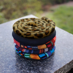General 25-inch length wraps medium-thick dreads securely.