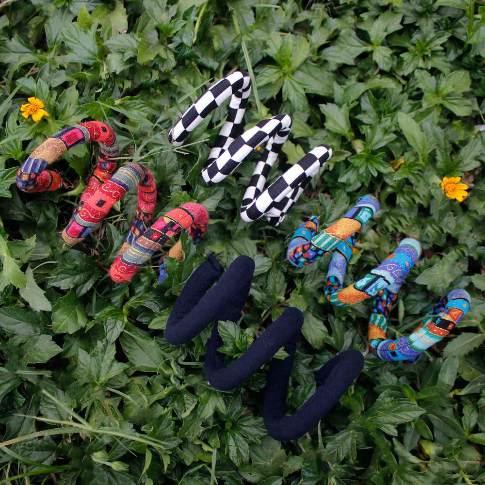General Versatile wrap for dreads, braids, and curls.