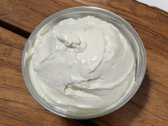 Texture scoop of Generic Beef Tallow and Magnesium Body Butter demonstrating rich moisture