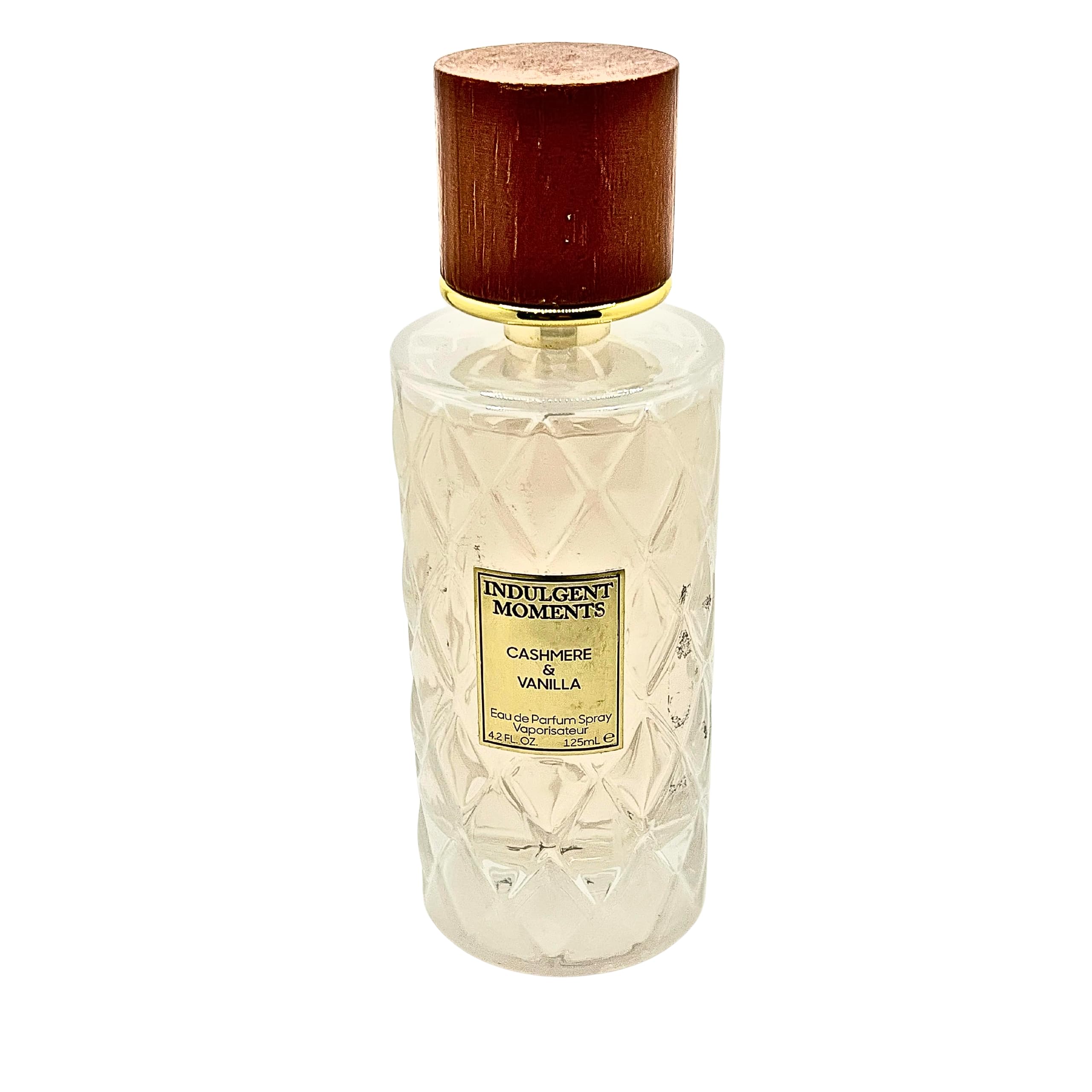 Generic Indulgent Moments bottle featuring cashmere-vanilla scent for daily elegance.