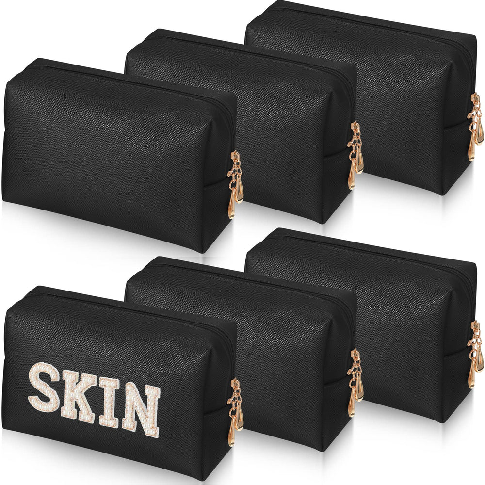 Gerrii Preppy Patch makeup bag in black with zipper for secure storage.