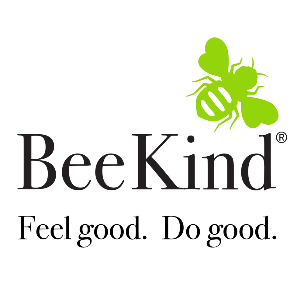 BeeKind honey lemon verbena lotion in a bathroom setting.