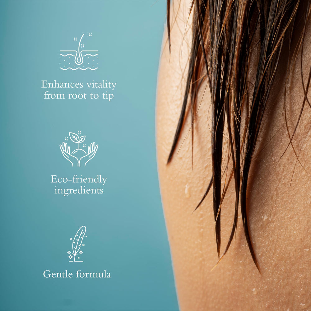 Gilchrist & Soames Zero% Unisex Conditioner application on hair suggests deep hydration and smoothness.