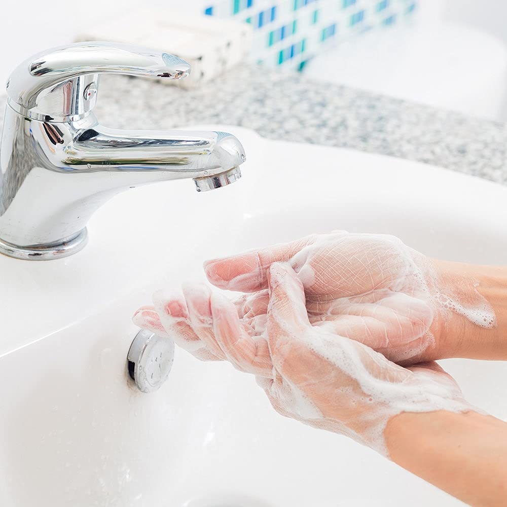 Ginger Lily Farms Botanicals clean hands close-up with fresh, hydrated skin.